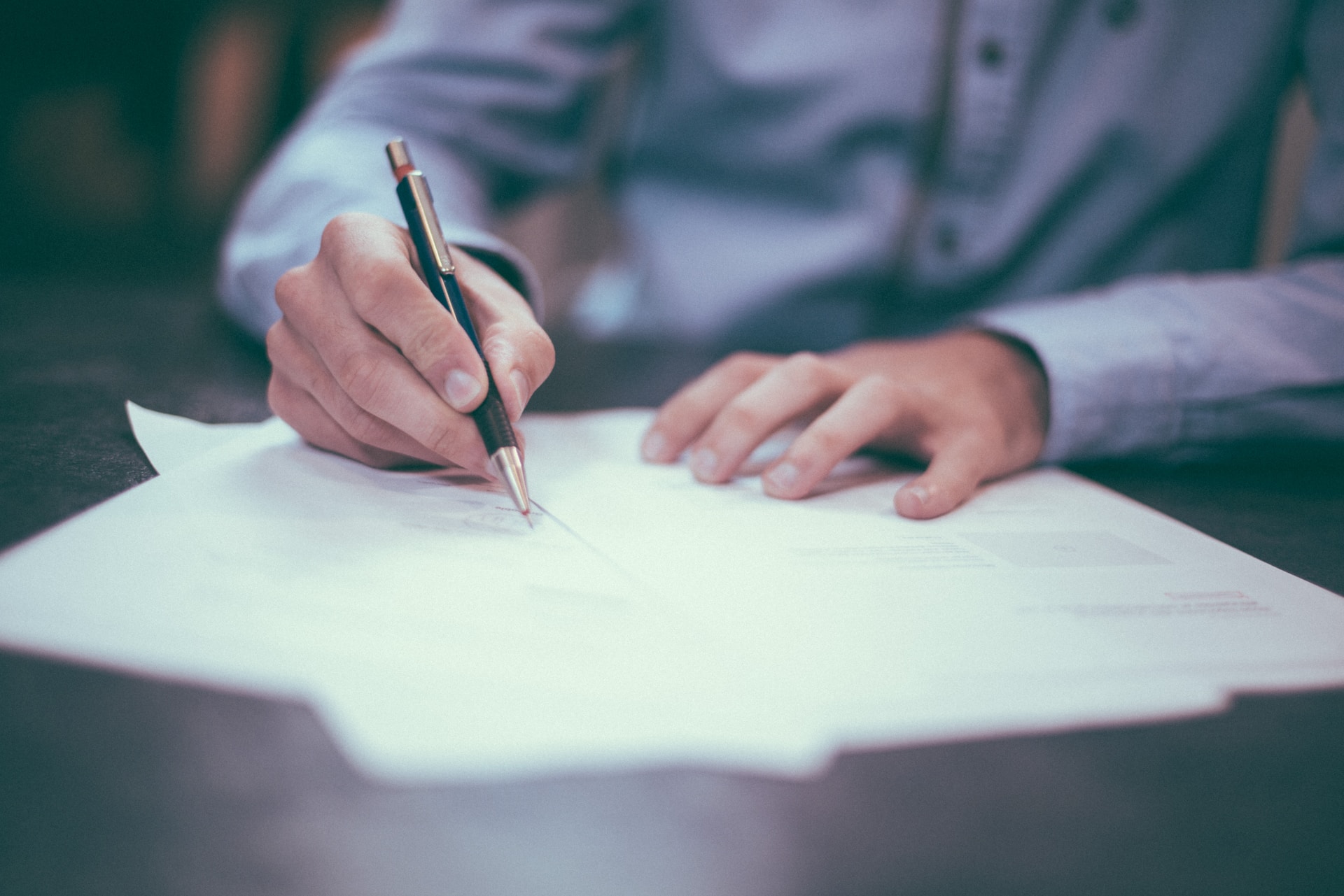 Person signing legal documents